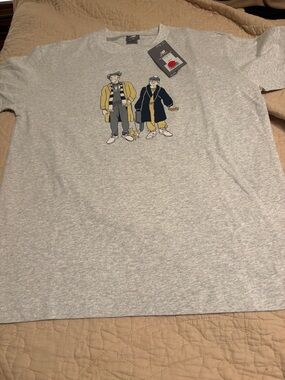 New Balance Heather Gray Short Sleeve Tee with Two-Character Cartoon Graphic